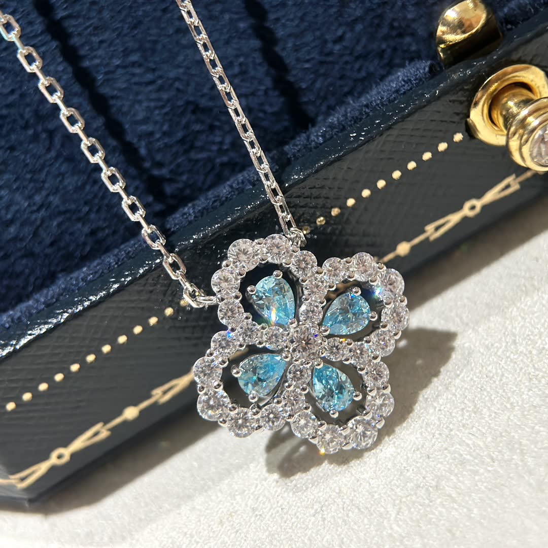 Van Cleef & Arpels Elegant Blue Diamond Flower Pendant